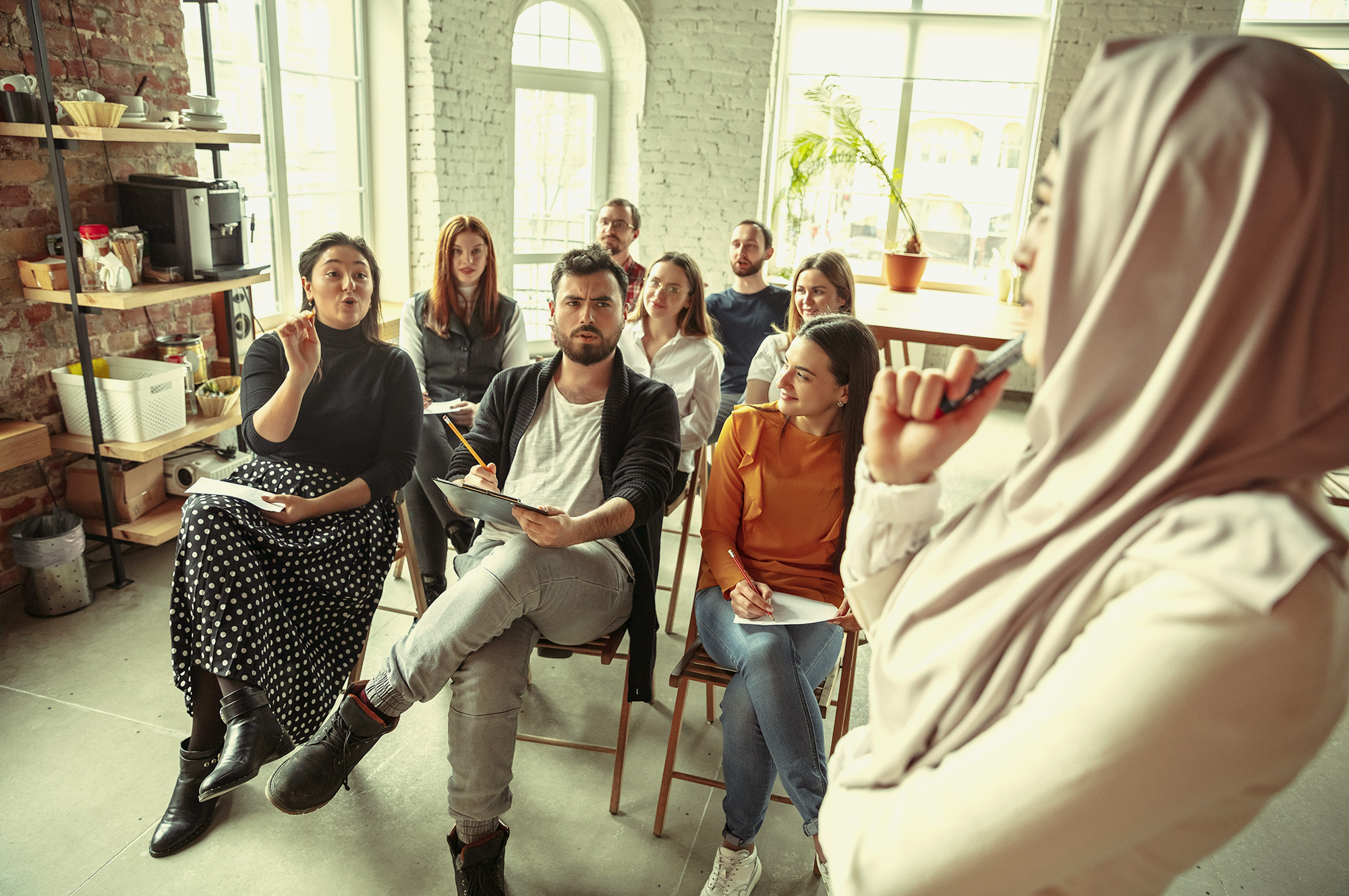 person giving presentation to audience