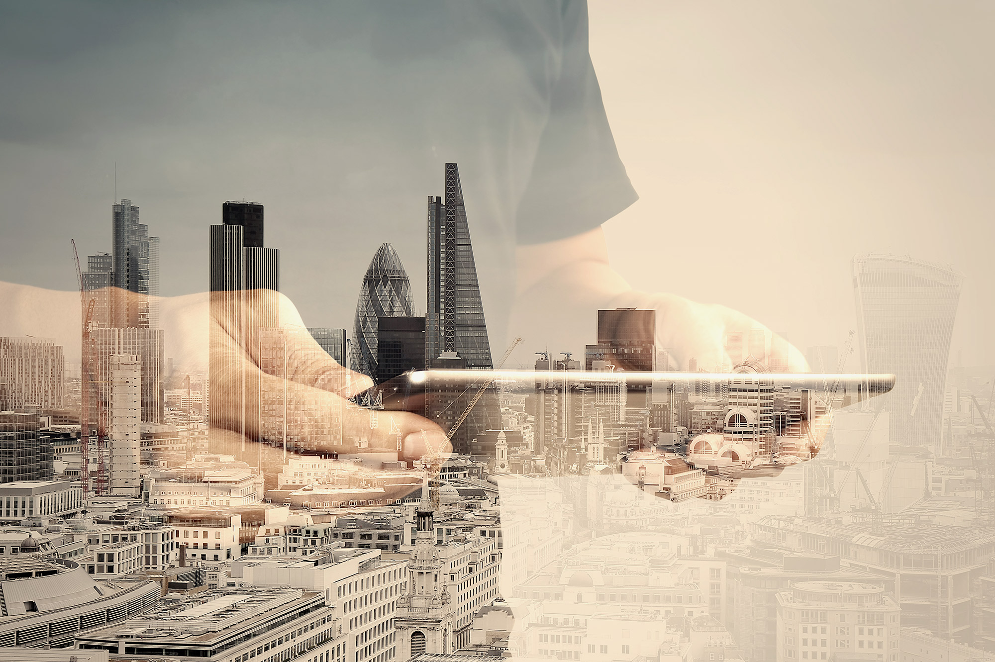 business person using digital tablet with building and social media diagram