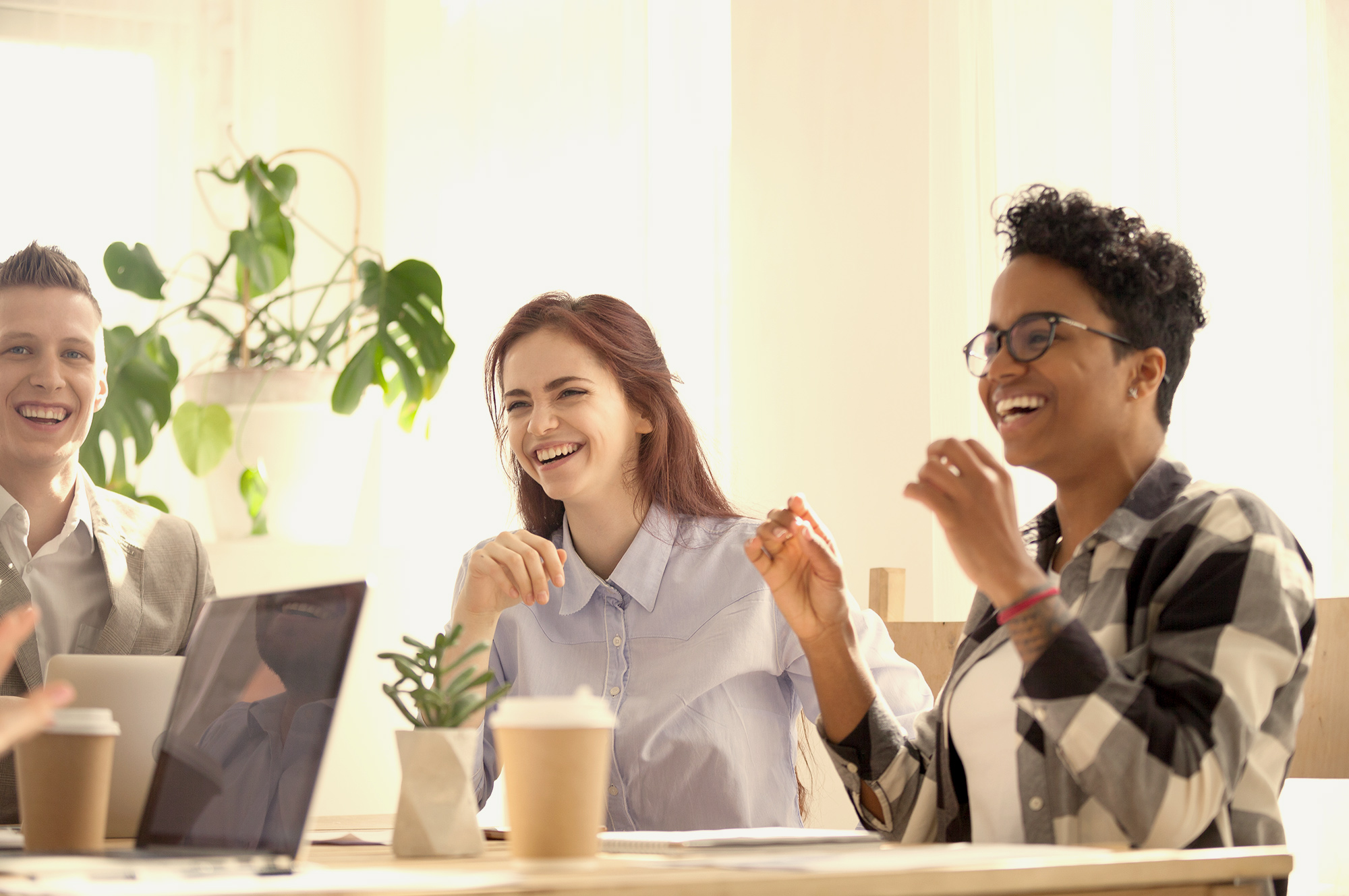 millennial employees engaging with colleagues